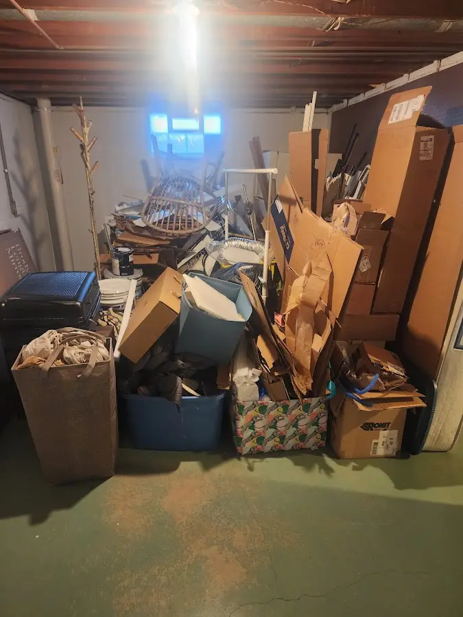 Roll-off dumpster container at job site for 15 Yard Dumpster Rental in Genoa